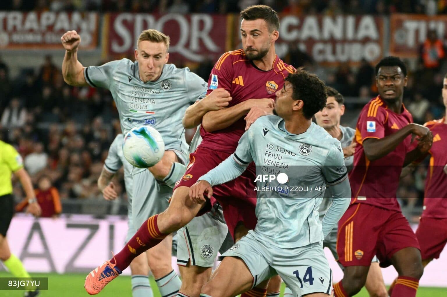 Roma defeated Udinese 2-0 to take the lead in Serie A.